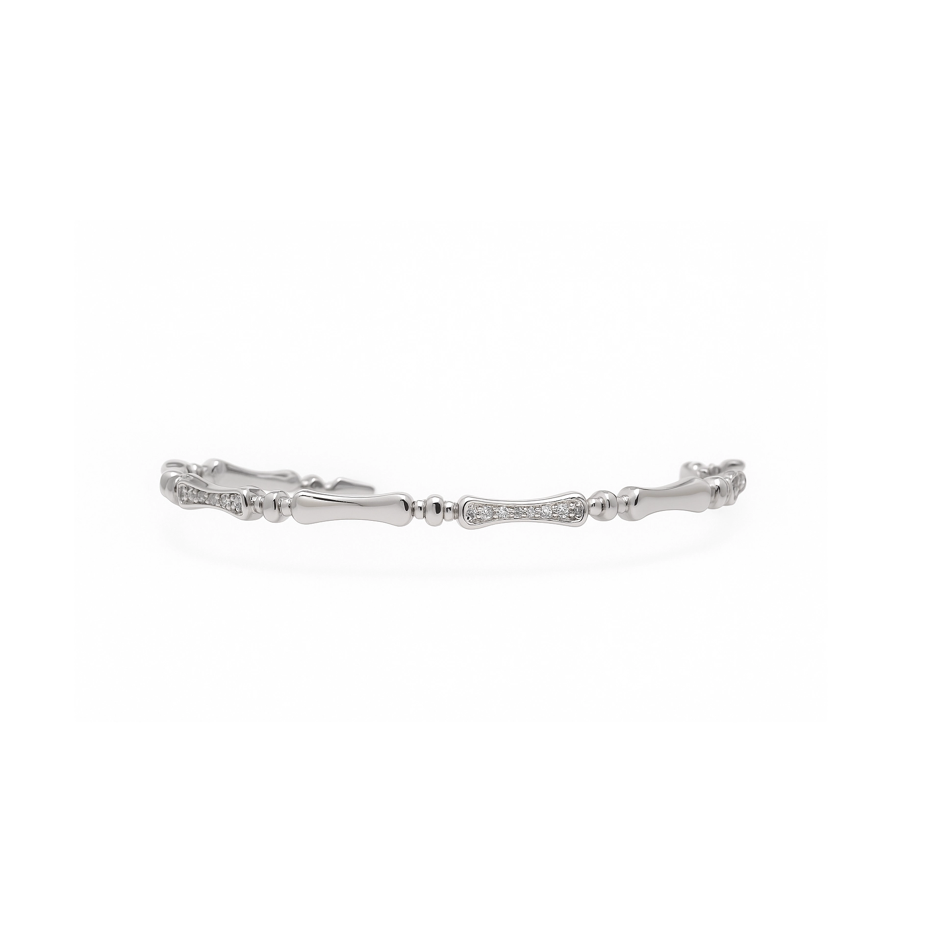 White gold bamboo link tennis bracelet displayed on jewelry stand