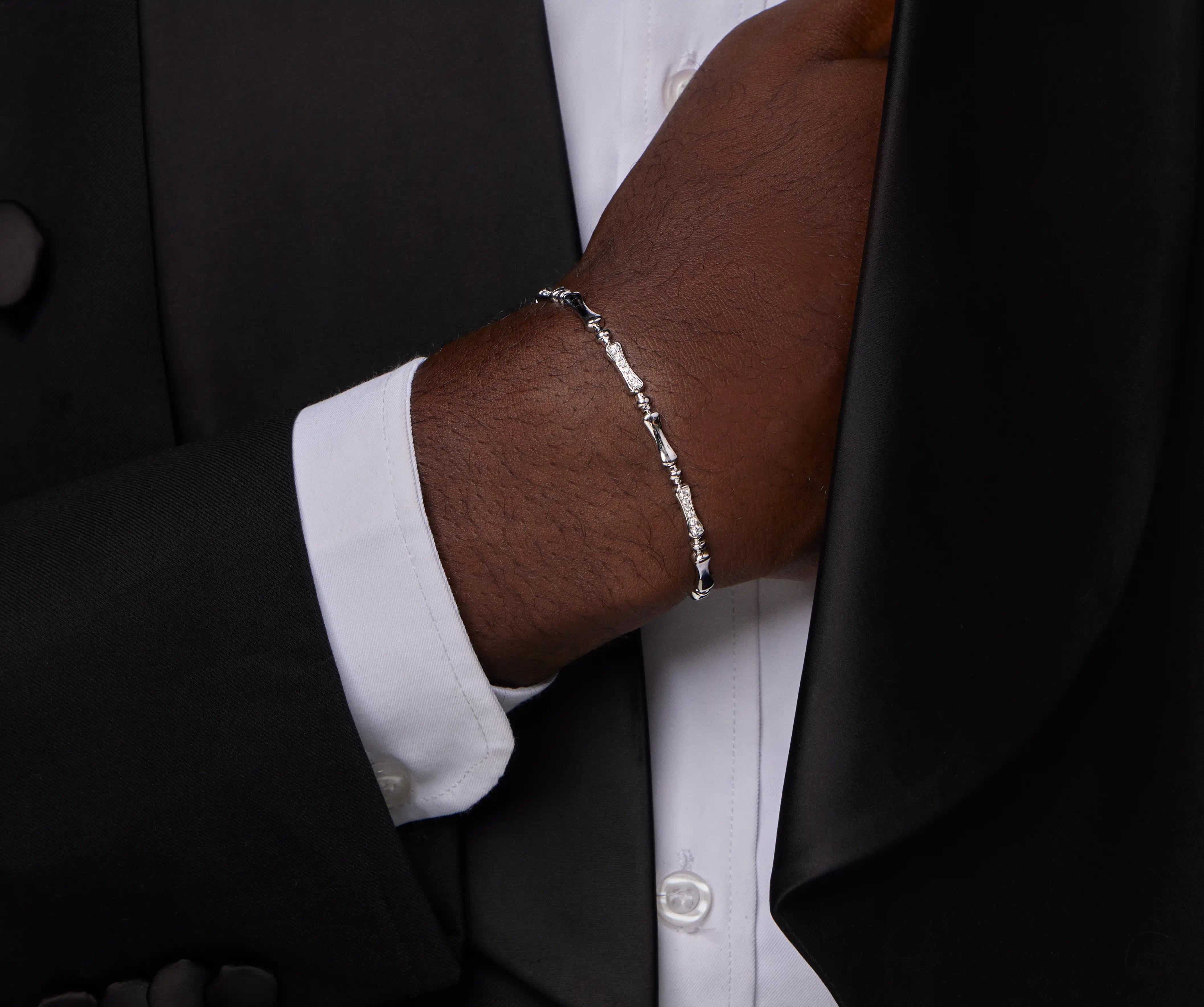 Side view of bamboo-inspired bracelet links showing textured detail
