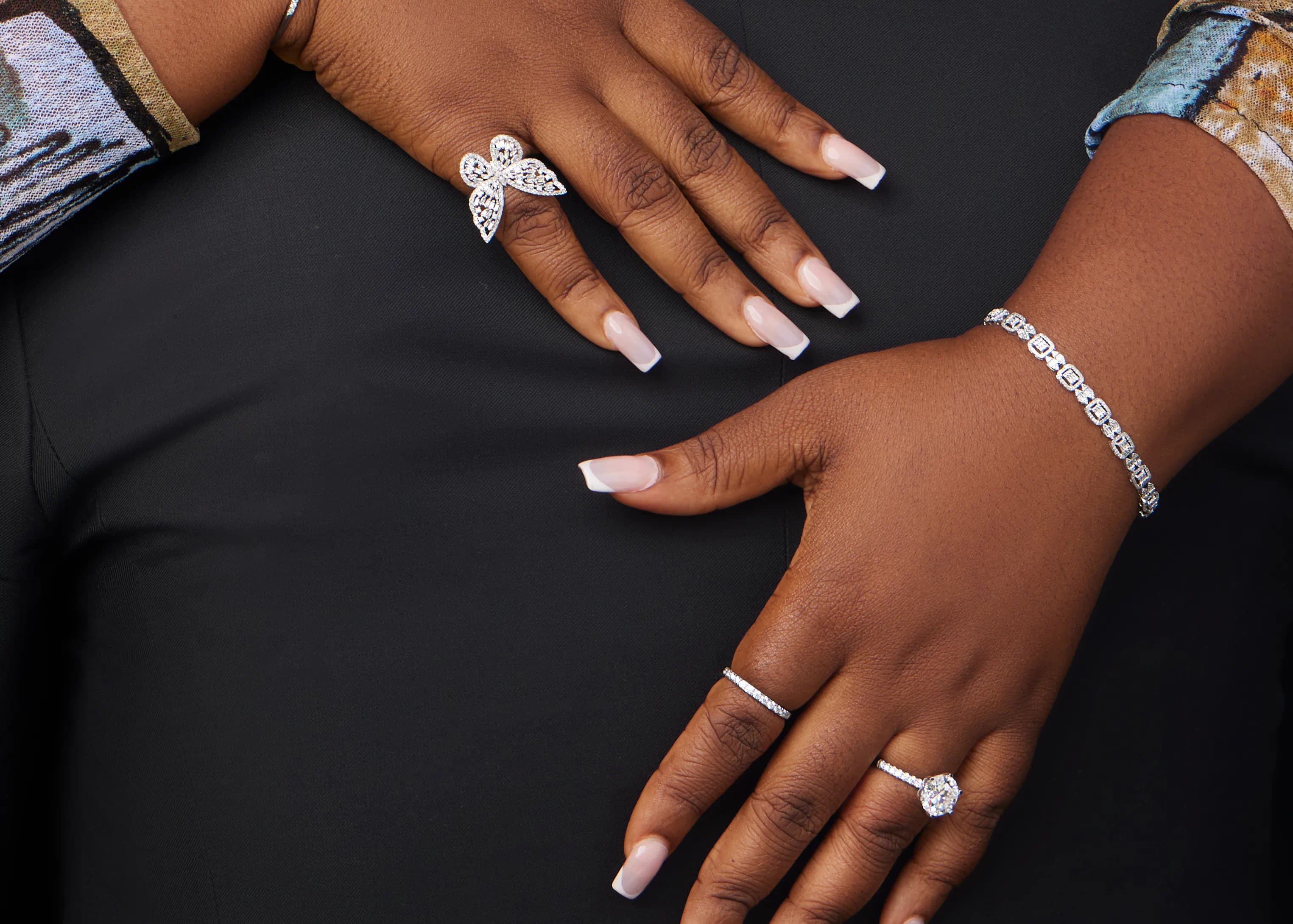 Couple hugging with an engagement ring