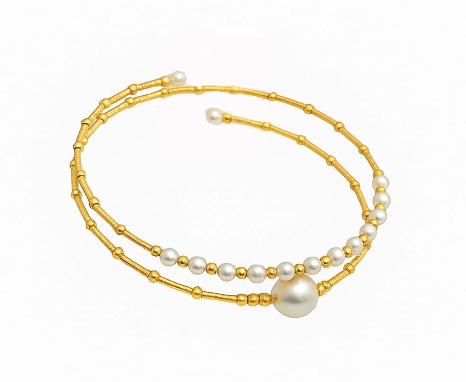 18K Gold and Akoya Pearl Adjustable Double Bangle showing interlocking design