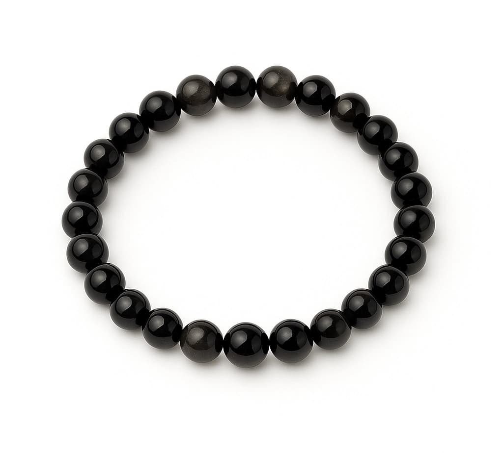 Polished tourmaline gemstone bead showing colorful striations